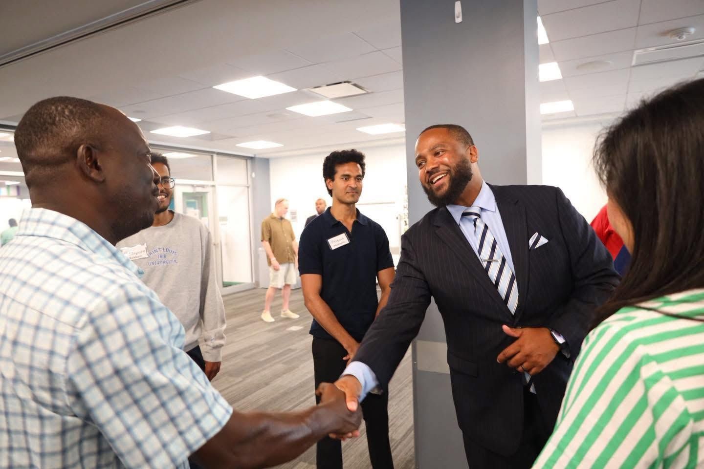 Dr. Fields greeting educators in St. Louis