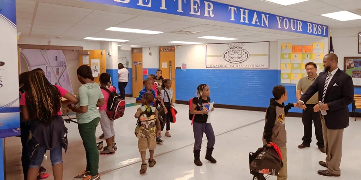 Koch Elementary hallway with the Better Than Your Best mural